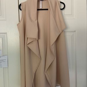 Sleeveless light tan cardigan